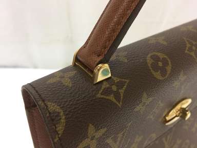 Sold at Auction: Louis Vuitton, Louis Vuitton Leather Monogram Malesherbes  Purse